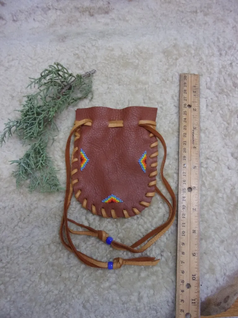 Beaded medicine bag, carved fetish bag, drawstring leather pouch, handmade amulet bag