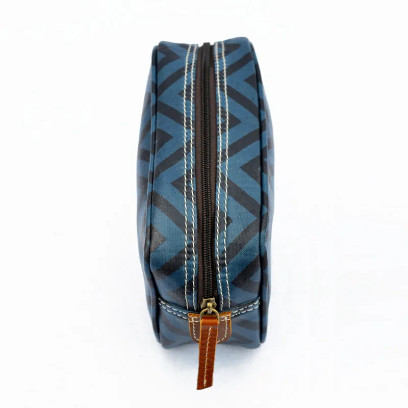 Blue toiletry handbag, chevron print, laminated bag, make up or cosmetic bag, utility pouch